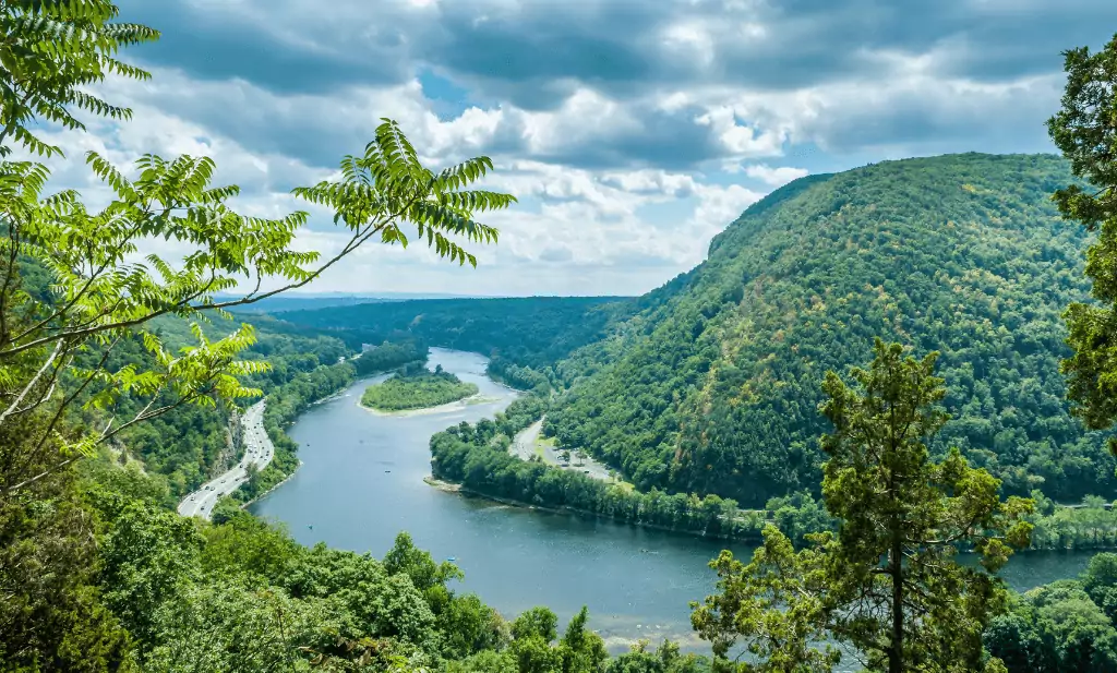 Delaware water gap seen from mt tammany mountains covers with trees and water is a great place to go after you get your medical marijuana card