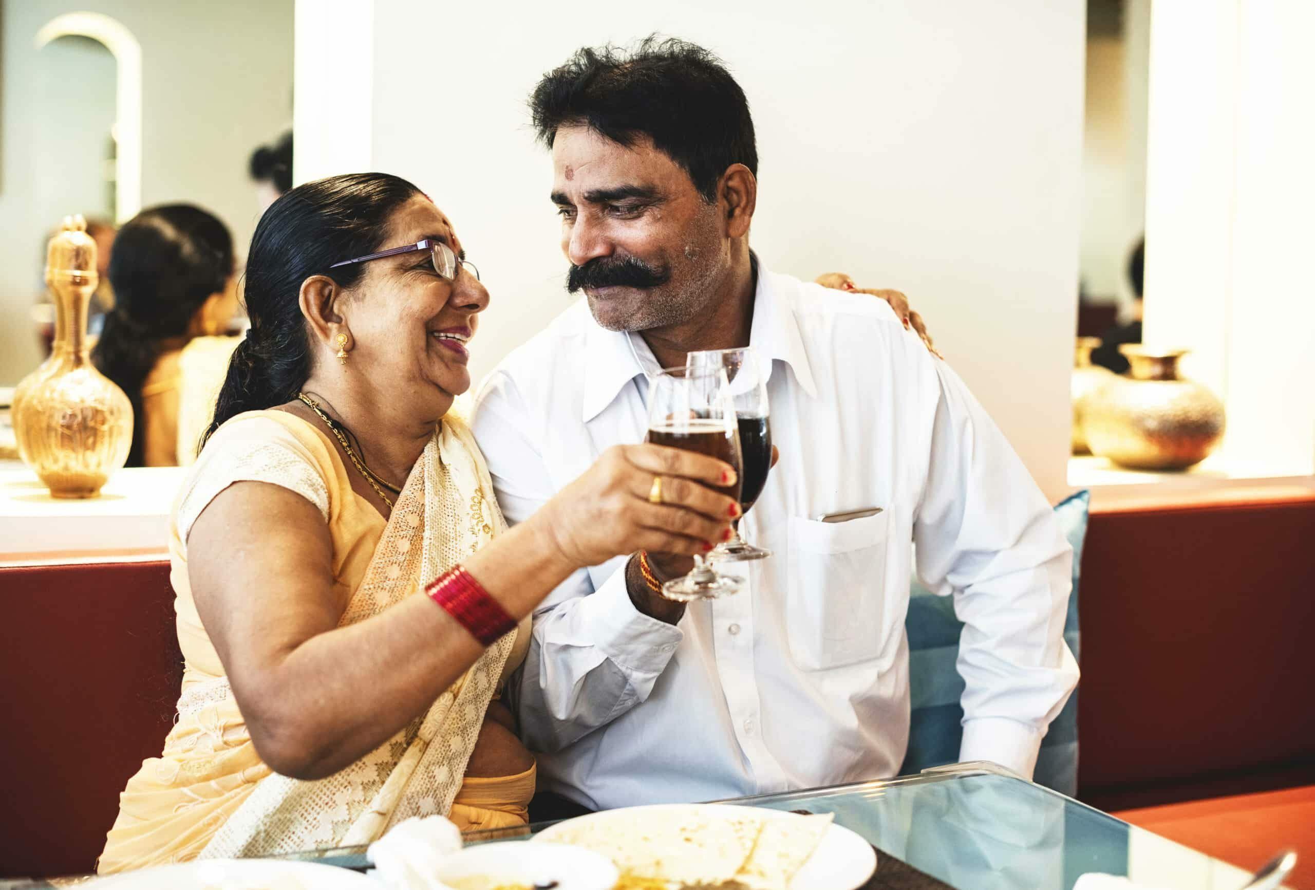 happy Indian couple celebrating after getting medical marijuana card