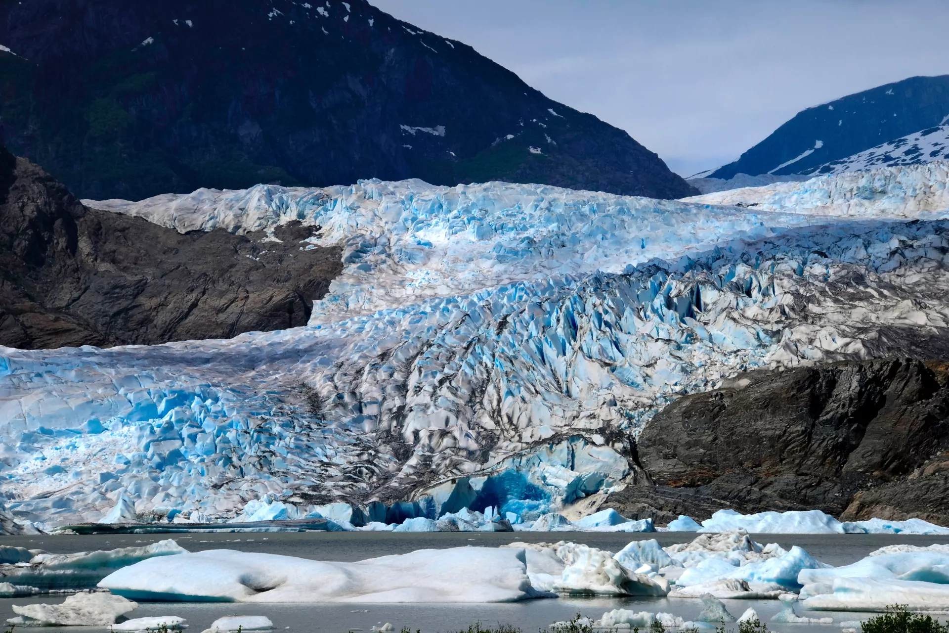 A must-visit destination for anyone traveling to Juneau, Alaska's capital city, is the Mendenhall Glacier, located in the Tongass National Forest and stretching over twelve miles long from the Juneau Icefield to the beautiful Mendenhall Lake.