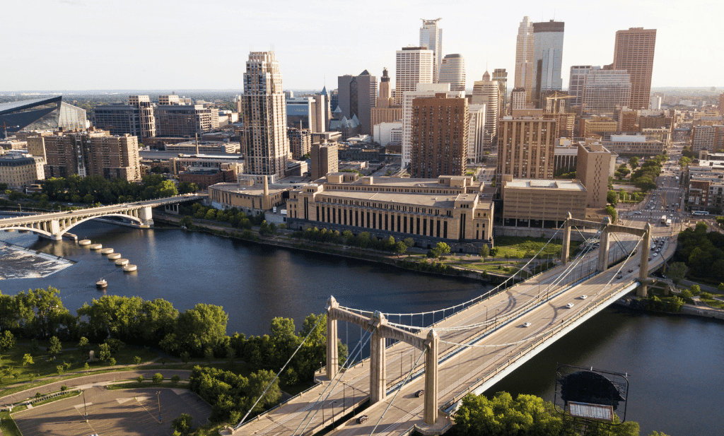 Later afternoon sunshine over an aerial view of downtown minneapolis skyline is a great place to go after getting approved for a medical card