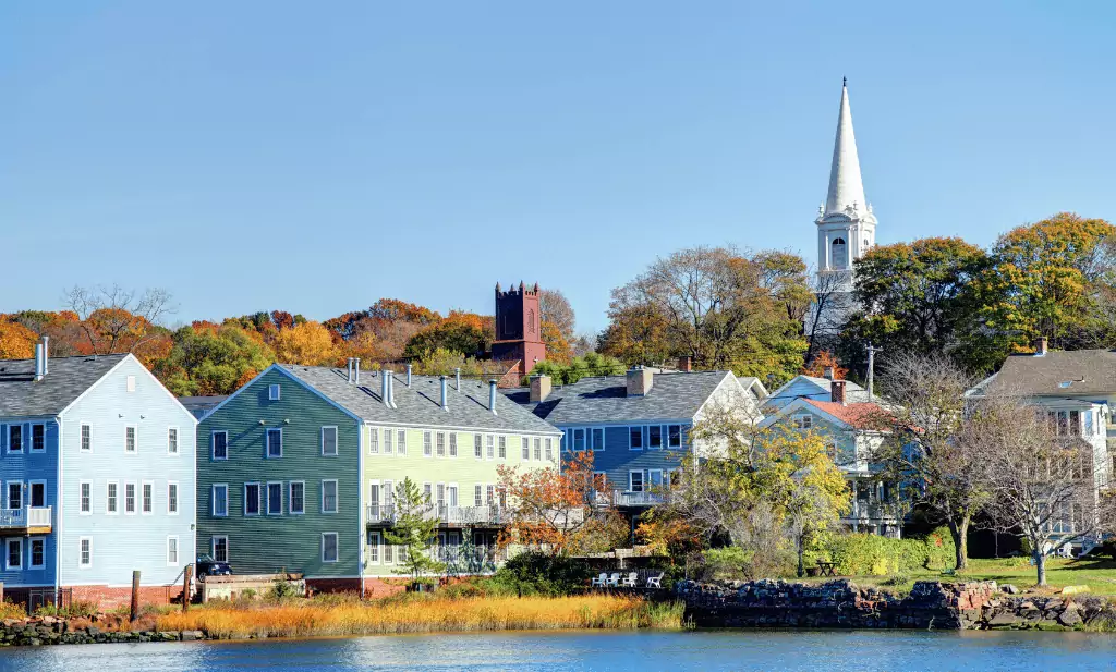 New Haven homes and church steeple in the background in the fall is a great place to go after you get your medical marijuana card