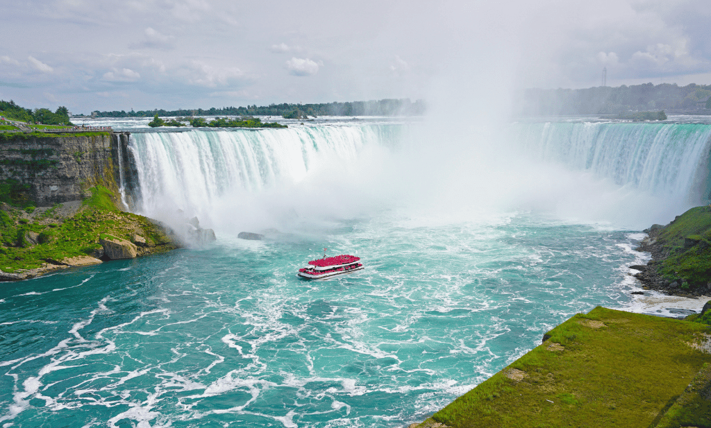 Niagara Falls with boat at the bottom of the falls full of people as a great place to go after you get your medical marijuana card