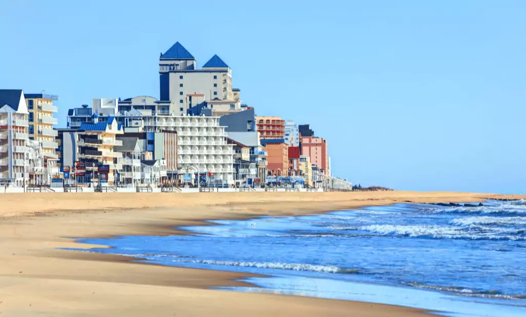 ocean city beach with buildings in the background along the beach is a great place to visit after getting your medical card